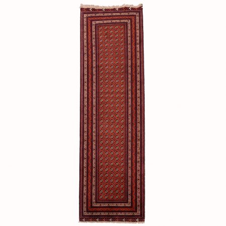 Fine Afghan Kunduz runner with all over Khoja Roshnai design on a red ground.