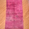 Purple Moroccan Berber Beni Mrirt Carpet with ancient tribal symbols. Handmade, wool pile hand-knotted onto wool.