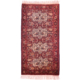 Hand-knotted wool pile old Belouch Tavusi rug with distinctive design of peacocks and other bird motifs; colours of red, black, cream and gold.