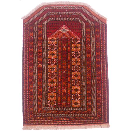 An unusual Turkoman Prayer Rug woven in an unusual shape with asymmetric design in rich colours of red, black, orange, green and cream.