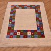 Funky handknotted modern Gabbeh Rug with plain natural beige field and a jazzy multi-colour chequerboard inset border.