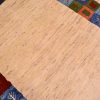 Funky handknotted modern Gabbeh Rug with plain natural beige field and a jazzy multi-colour chequerboard inset border.