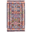 Maimana Kilim Rug: black and cream along with green, rust, purple and blue. It has an all over geometric design.