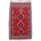 Vibrant handwoven Persian Qashqai Kilim Rug with rich red main colour & geometric quadruple medallion design & contrasting jewel detail colours.