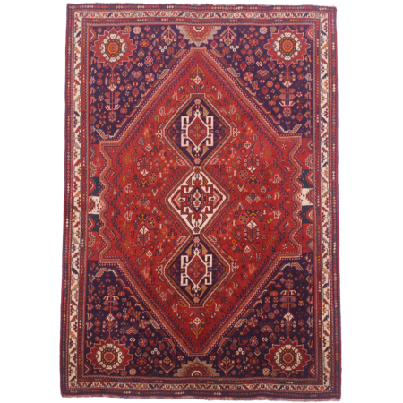 Old Qashqai Rug with traditional triple medallion on a madder red field with dark blue corners and beige border.