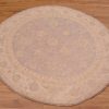 Beautiful handmade Afghan Ziegler Circle Rug with soft colours of grey with beige in a hard-to-find circular rug size.
