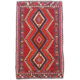 Colourful handwoven vintage Qashqai Kilim Rug with triple medallion. Rich contrasting colours of red, orange, blue, cream and olive green.