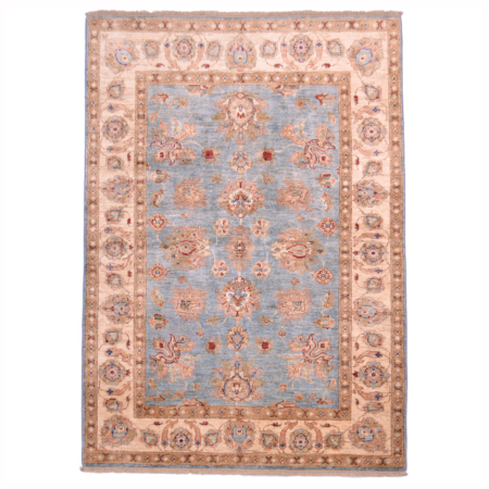 Light Blue Ziegler Rug with all over floral design and beige border with floral patterning.