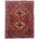 Persian Afshar rug with geometric double medallion design in colours of rust, navy, cream, orange and green.