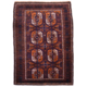 Finely hand-knotted old Balouch rug with aubergine-brown main colour plus detail colours of orange, cream and blue. Large scale Bokhara design.