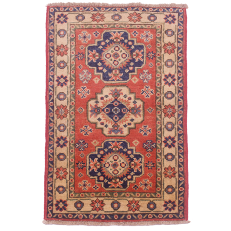Hand-knotted wool pile Kazak mat with geometric design & terracotta primary colour along with navy and cream.