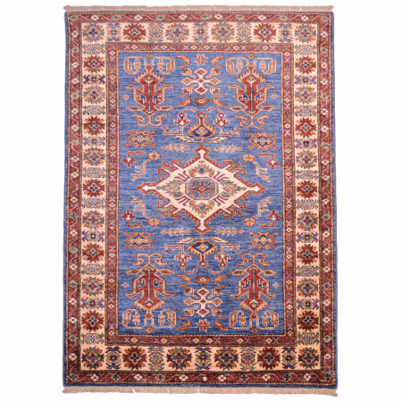 Fine Kazak rug blue field with beige border.