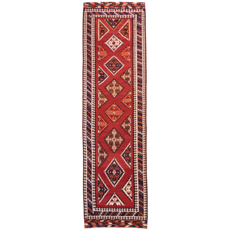 Extra Large Qashqai Kilim runner with medallions on a red ground.