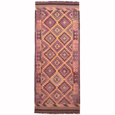 Vintage Afghan Kelim runner with mature colours of purples, brown, and ochre yellows.