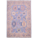 Afghan Oushak carpet with blue field, grey border as well as details of navy, green, yellow, beige and lilac.