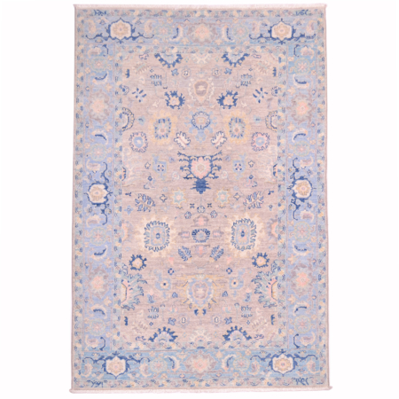 Afghan Serapi rug with super soft pastel colours, floral design on a grey field with soft blue border.