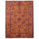 Extra fine Suzani rug with amber/mustard ground and floral design.