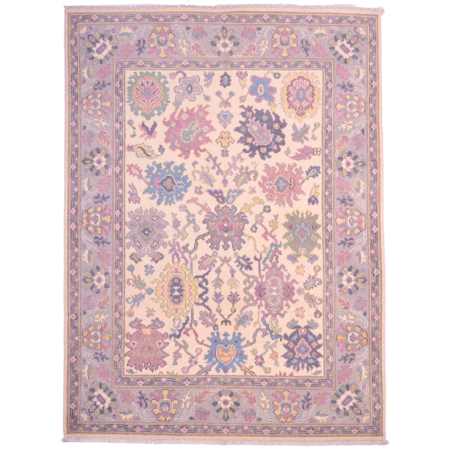 Oushak dozar rug; beige with large scale floral design in blue, green, yellow and grey, with grey main border.