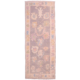 Oushak runner with all over floral design on a grey ground.