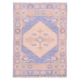 Oushak mat with cream medallion on a light blue ground.