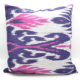 Ikat Cushion with indigo-purples with raspberry pink contrasting with a white background.