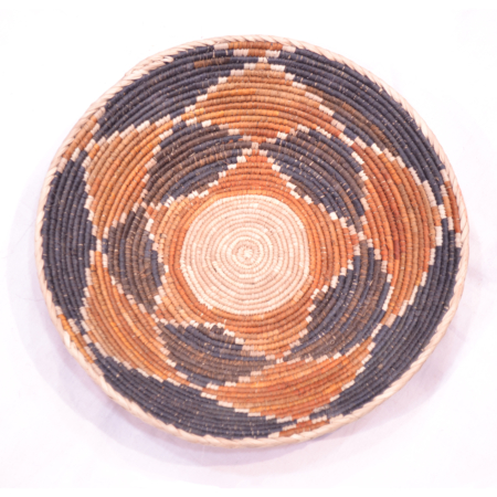 Pakistan Wicker Basket: star design with rust, black and beige.