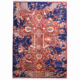 Abstract Sickle-Leaf carpet with fragmented floral design in colours of red, blue and grey.