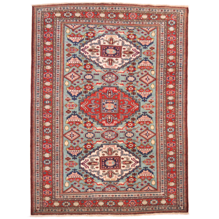 Caucasian Vintage Shirvan rug with geometric design; peppermint main colour with red and cream.