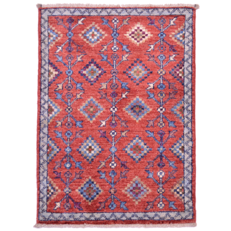 Afghan Chobi tribal design rug with rust-red main colour.