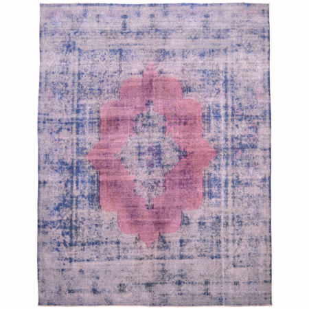Large Overdyed carpet with elegant floral medallion design set on a raspberry field with contrasting blue border and medallion.