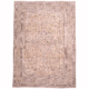 Vintage Oriental carpet with faded colours of gold, beige and taupe & geometric medallion design.