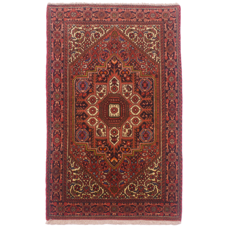 This hand-knotted Persian Gholtog rug has a geometric medallion design with colours of black, brown and cream.