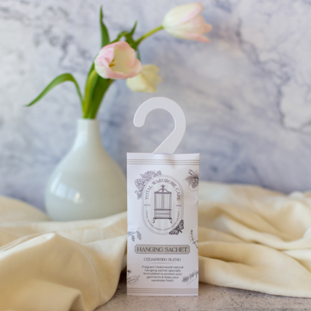 Hanging wardrobe sachet with cedarwood blend fragrance for natural moth protection and fresh-smelling wardrobes.
